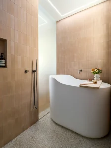 liberty street san francisco modern minimalist remodel shower japanese soaking tub pink cement tile standing shower terazzo tile floor to ceiling translucent glass copy 225x300